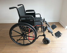 silla de ruedas negra perfil lateral