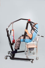 grúa para pacientes con sobrepeso, hombre sobre cómodo